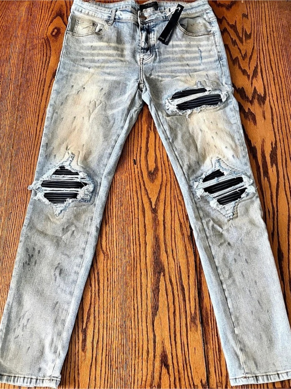 Amiri MX1 Paint Splatter Distressed Skinny Jeans Distressed Skinny Jeans in Blue